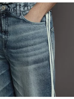 Джинсы Wide leg с лампасами