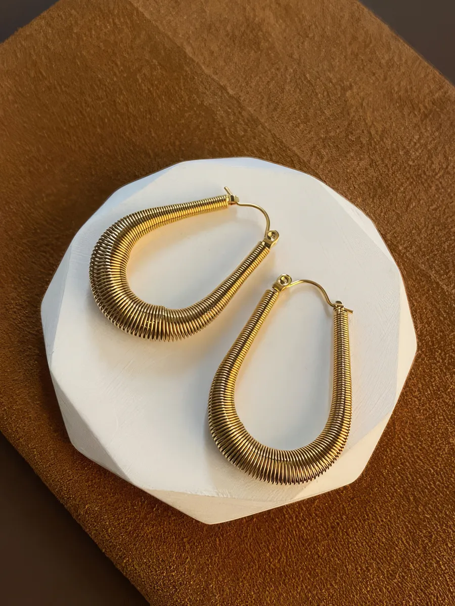 Серьги конго из титановой...